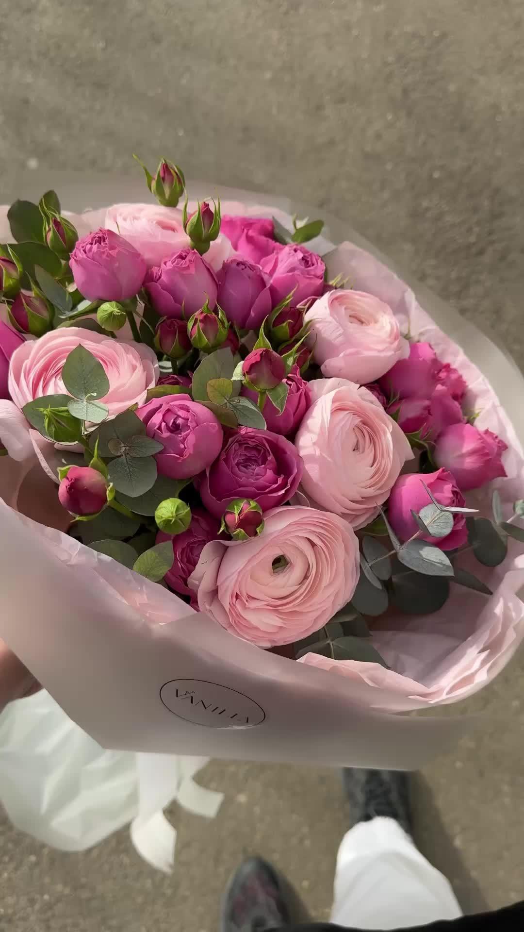 Professional floral arrangement in modern corporate setting